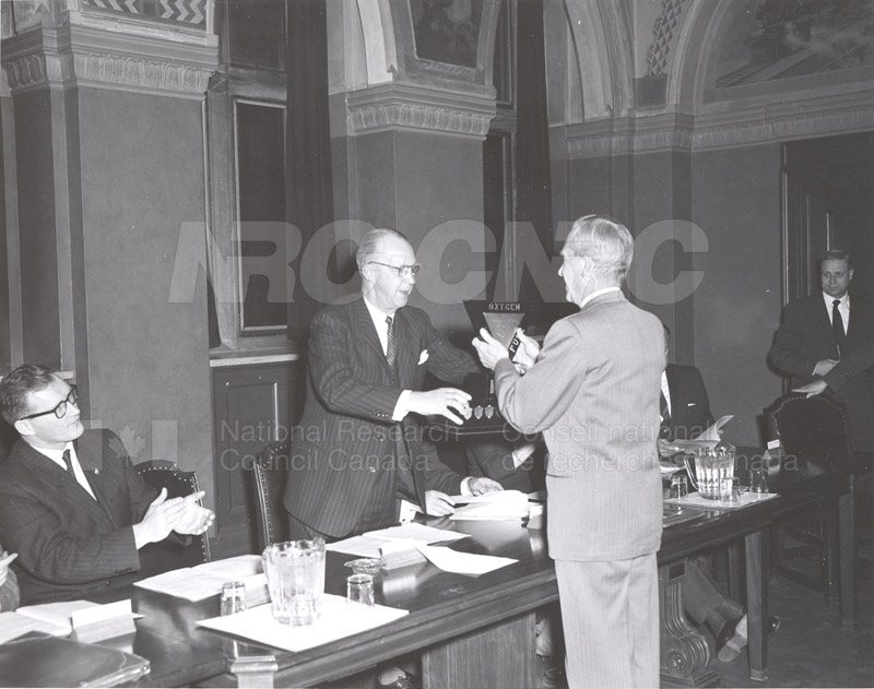 Presentation of Awards for Fire Prevention Contest Winner NRC, Dr. Steacie, J. Elliott 1961, 1962 006