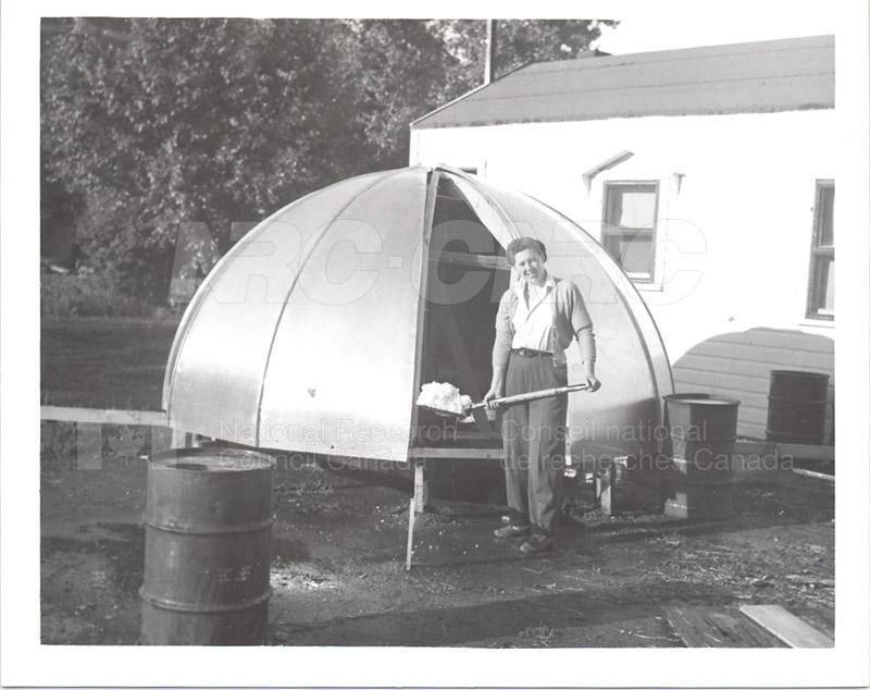 Jean Hodges Holding a Shovel July 1953
