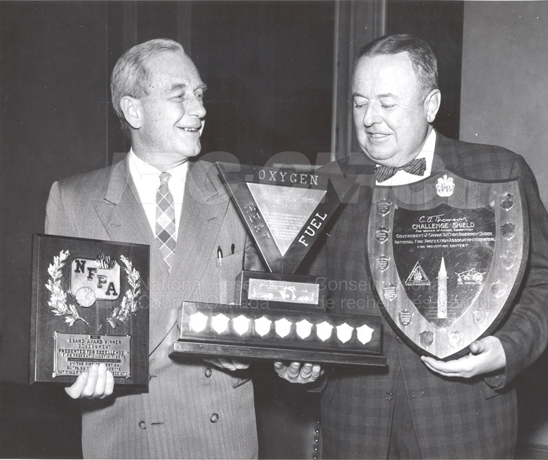 Presentation of Awards for Fire Prevention Contest Winner NRC, Dr. Steacie, J. Elliott 1961, 1962 003